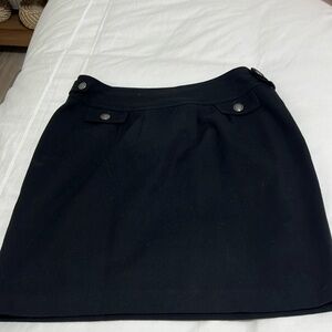 Banana Republic wool/poly mini skirt. Fully lined & side zipper. Size 14